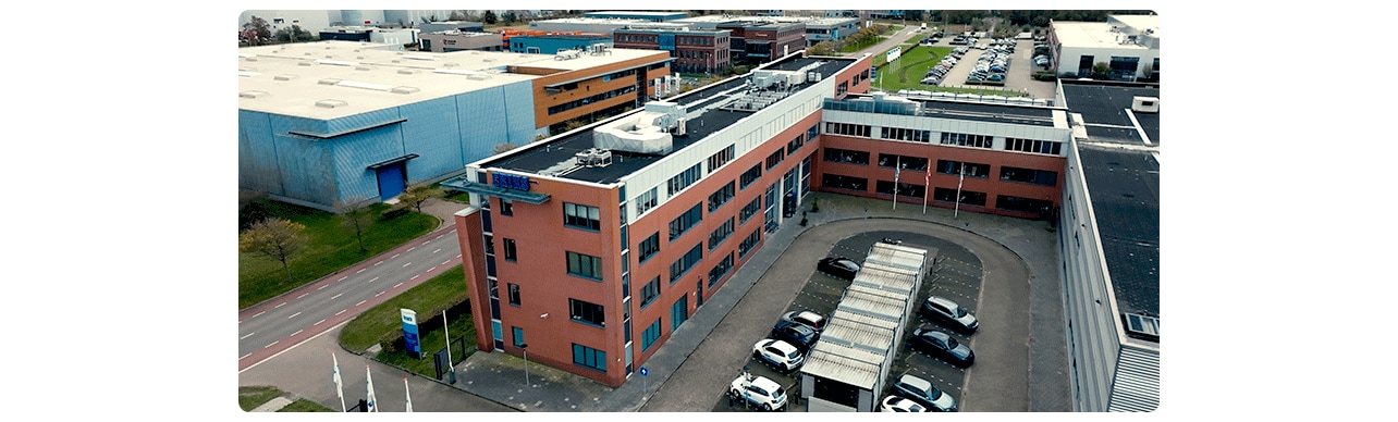 ERIKS office building Netherlands aerial view rooftop HVAC units parking corporate headquarters commercial complex