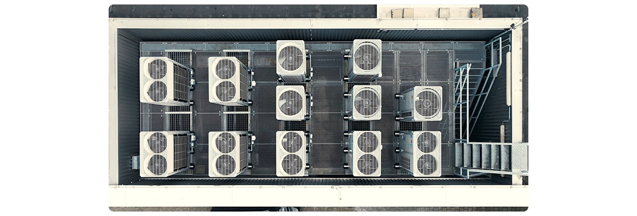 LG HVAC rooftop air conditioning system Netherlands industrial cooling units metal platform commercial ventilation setup