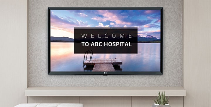 A TV is screening greeting messages with images.