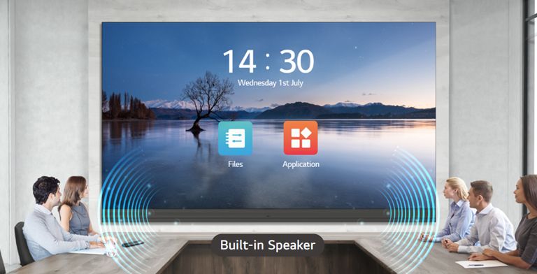 People have a meeting while watching the display and listening sound with the built-in speakers of LABA series, installed in the meeting room.