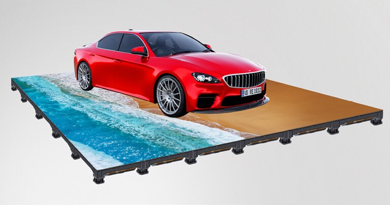 This demonstrates that the LEDs can withstand the weight of a vehicle on them and still work well.