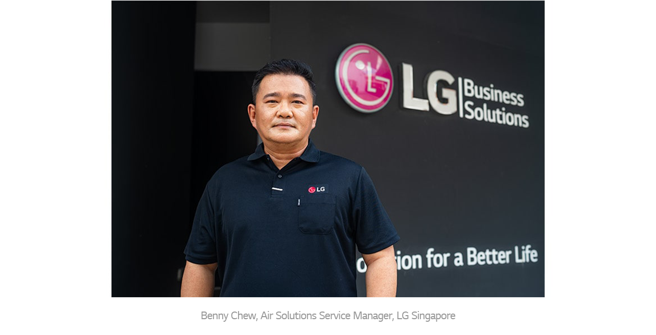 LG Business Solutions representative standing in front of the LG Singapore office, showcasing leadership in air solutions and HVAC services. The image highlights LG’s commitment to professional service and reliable climate technology.
