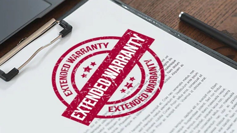 A paper with a "Extended Warranty" stamp.