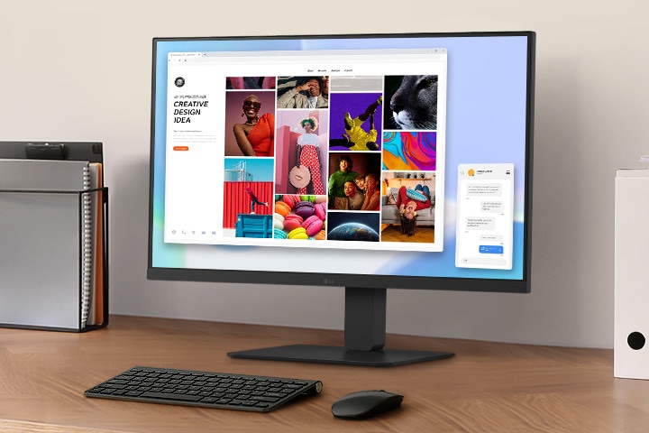 A workspace on a desk with a monitor and document holder.