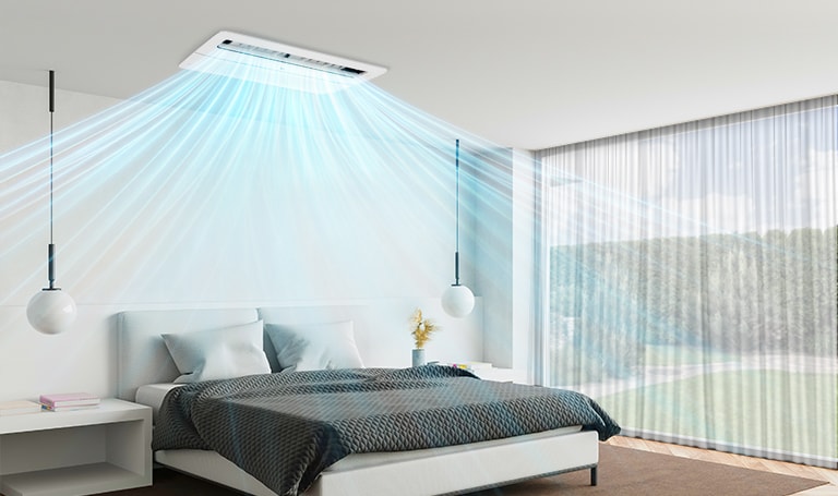 The LG One Way Ceiling Cassette is dispersing a visible blue airflow into a bedroom, furnished with a queen-size bed topped with a black blanket.