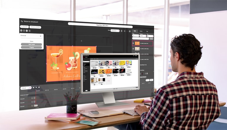 A man is creating content for the signage. The monitor screen displays a list of the generated content, while an editor for crafting content on a larger screen is also presented. Both screens provide genuine views accessible within the solution.