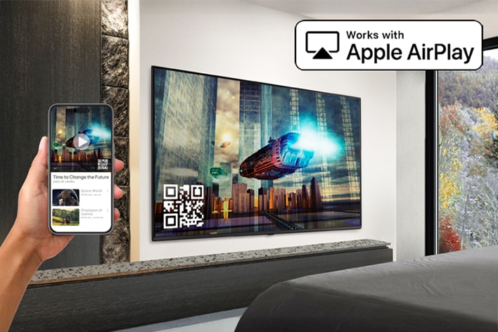 The image demonstrates that the AirPlay feature allows content from an iPhone to be displayed on the hotel TV.