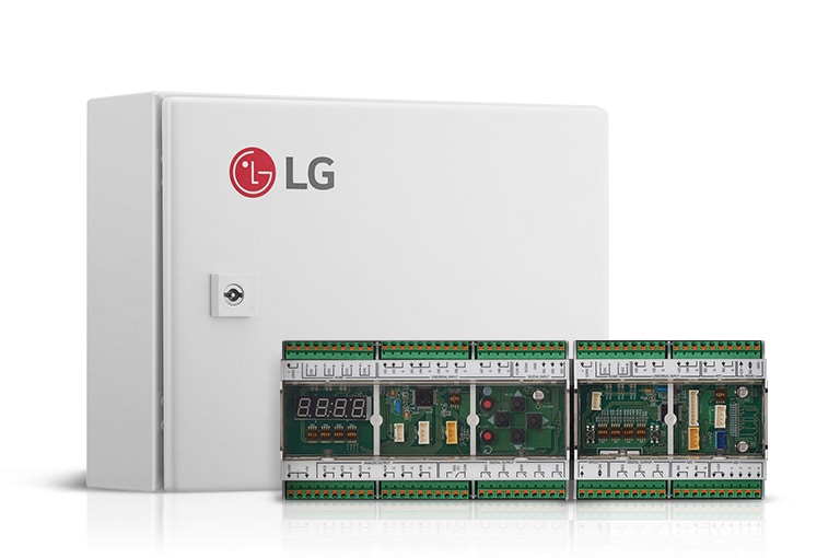 A white, rectangular enclosure with the LG logo on it. A smaller, gray module with two green connectors is placed in front of the enclosure.