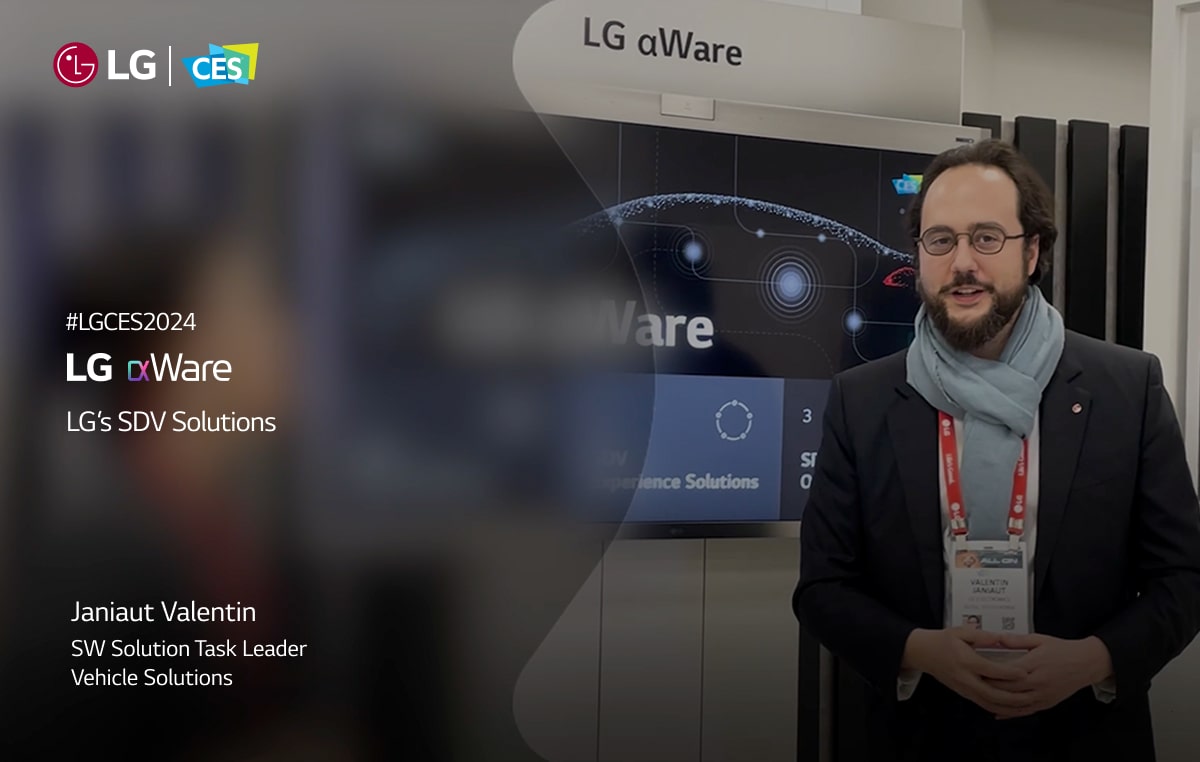 Image of a male staff explaining about LG Solutions at showcase