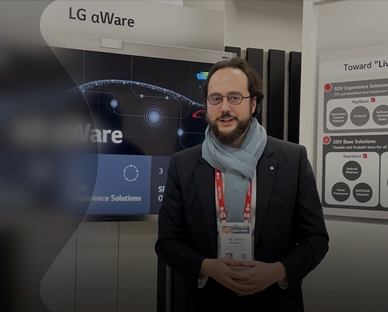Image of a male staff explaining about LG Solutions at showcase