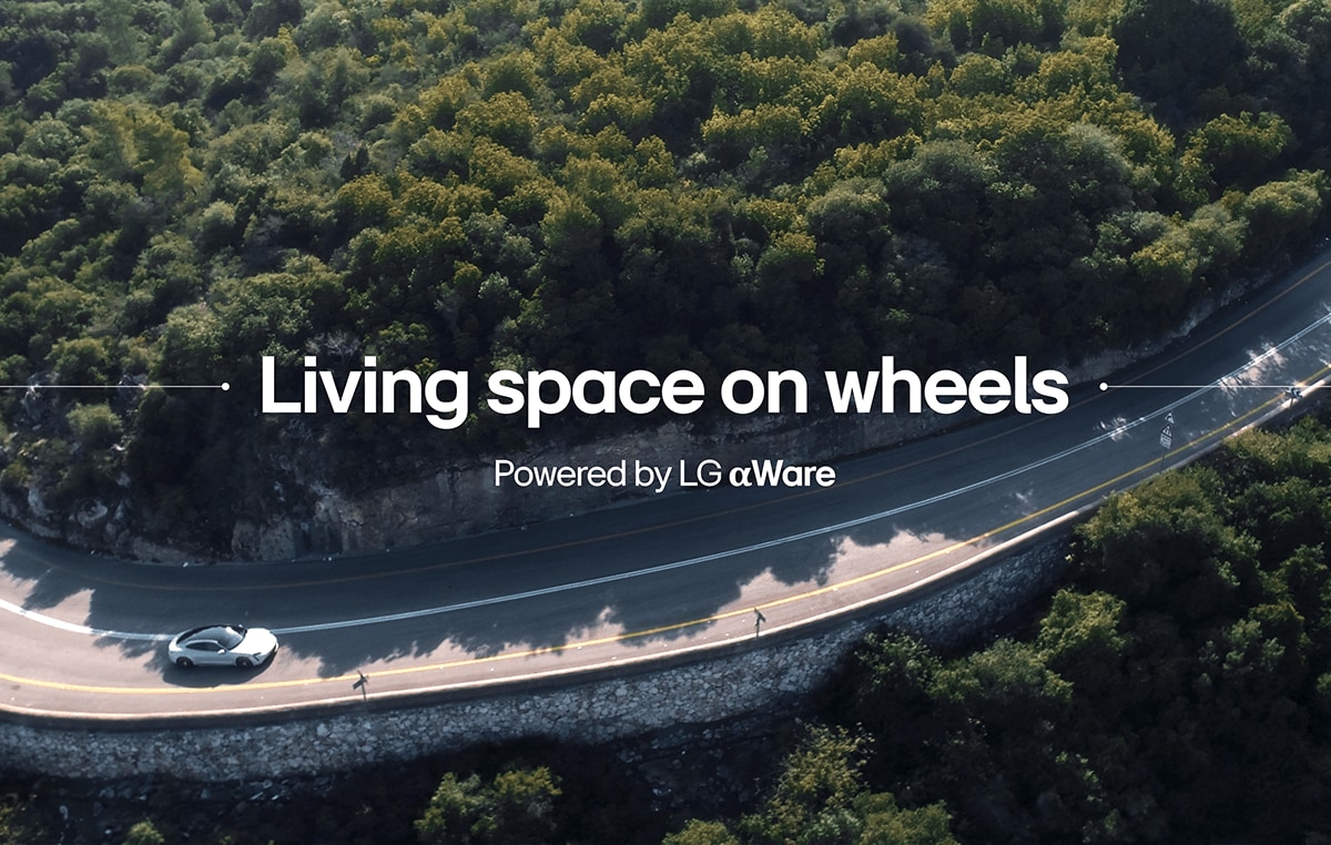 Video thumbnail of Vehicle running on the road next to the forest.