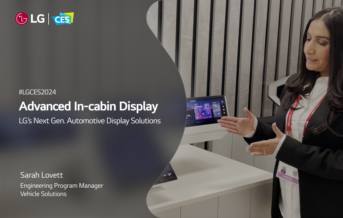 Image of a woman staff explaining about a LG next generation display