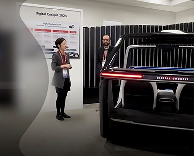 Image of a femail staff addresses LG's total in-vehicle infotainment solutions presentation