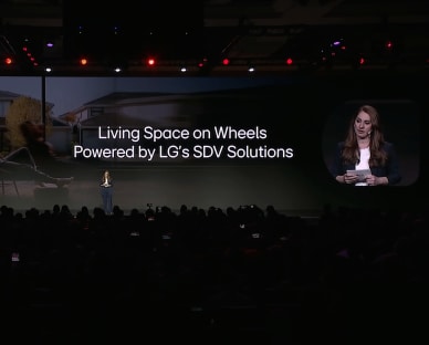 Picture of a woman who addresses LG Digital Cockpit presentation