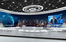 LG LED signage in virtual studio set showing news and global graphics. LG broadcast solutions delivering immersive backgrounds and professional media production.