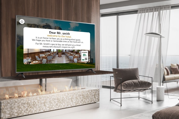 An LG commercial TV is installed in a resort room.