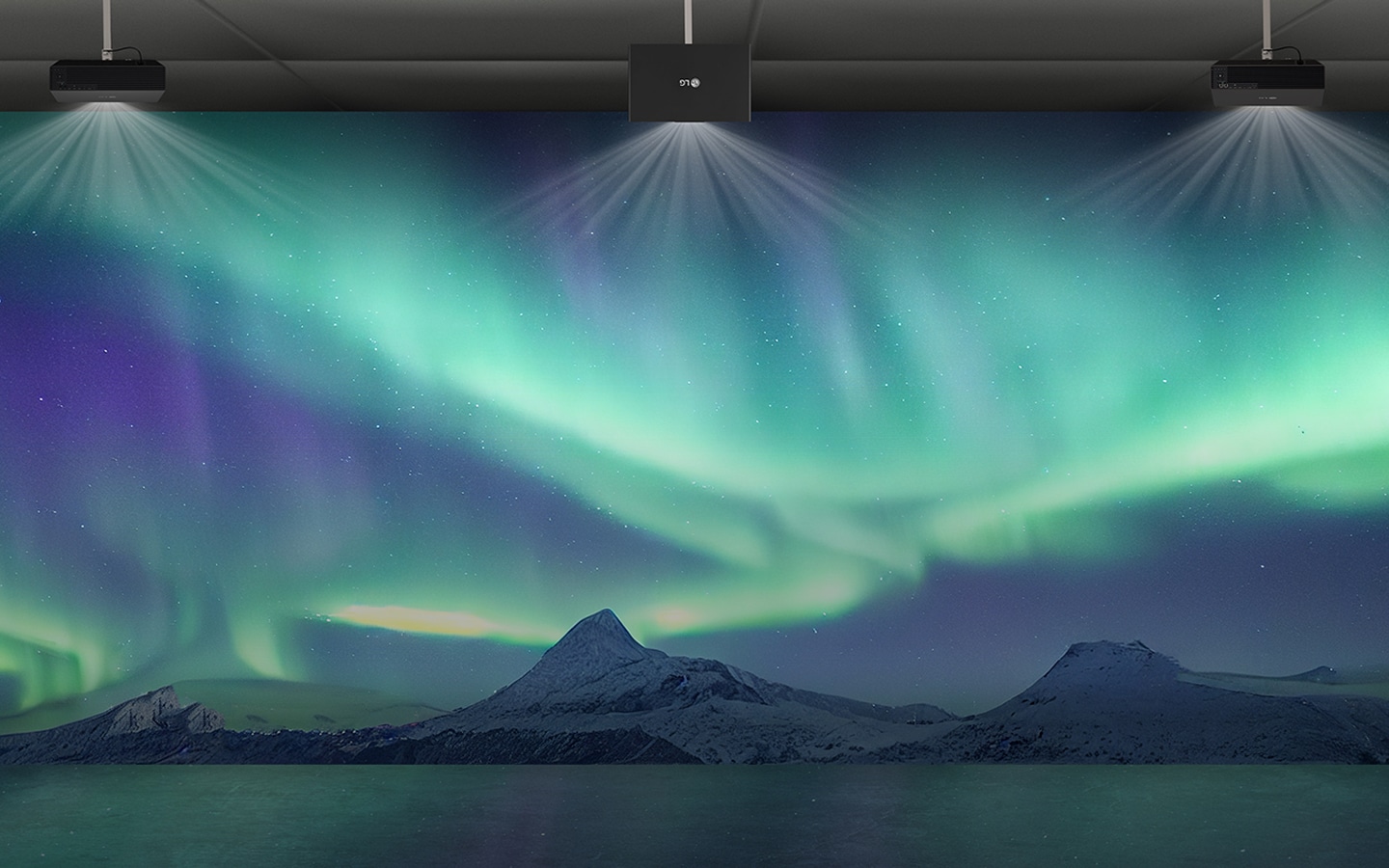 LG projector displaying vivid Northern Lights imagery on a large screen, delivering immersive high-definition performance.