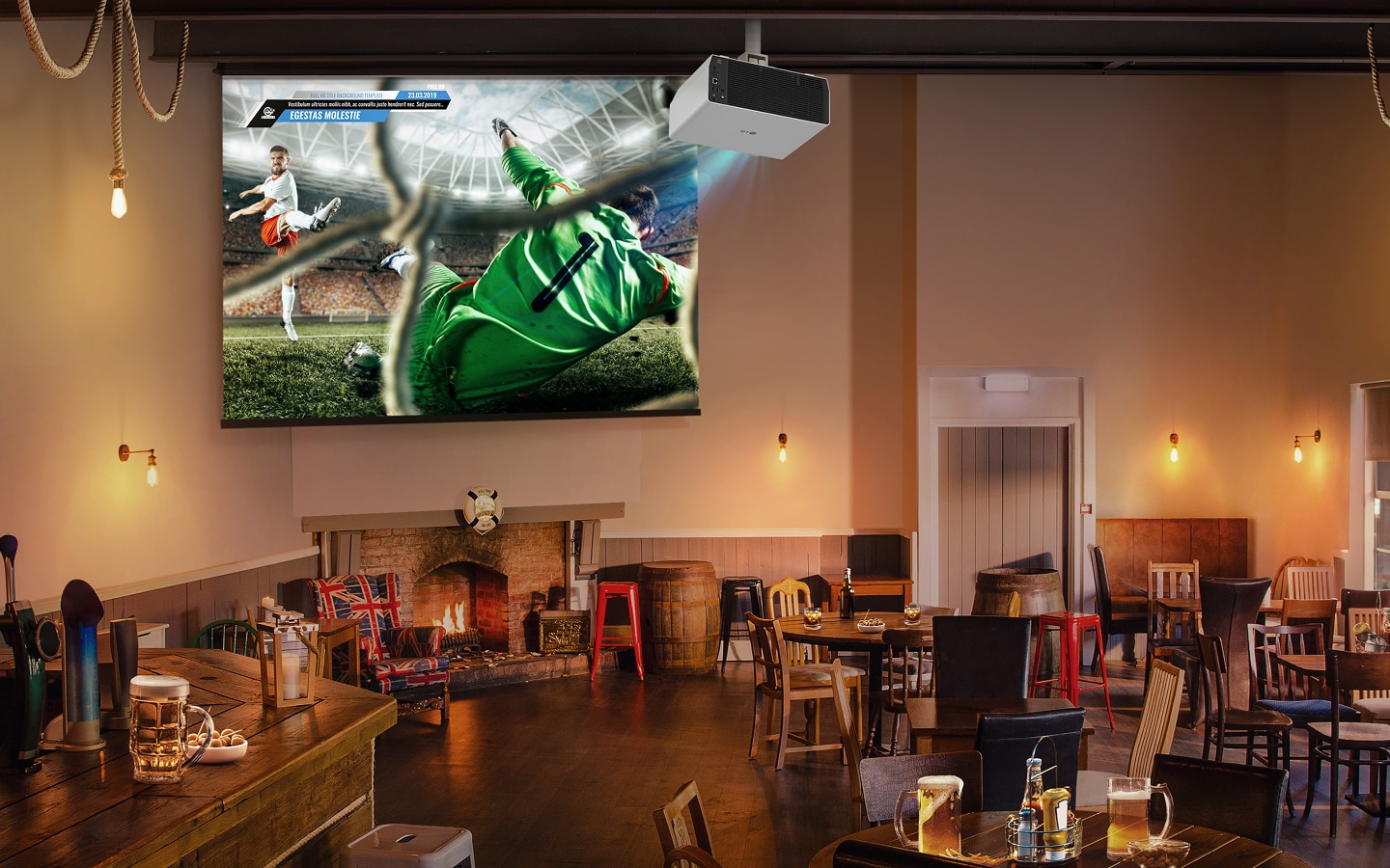 LG projector displaying live soccer match on big screen in a cozy pub interior