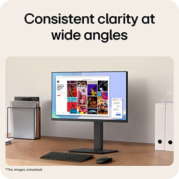 Office desk setup with a monitor displaying a colorful creative design interface, highlighting consistent clarity and wide viewing angles.