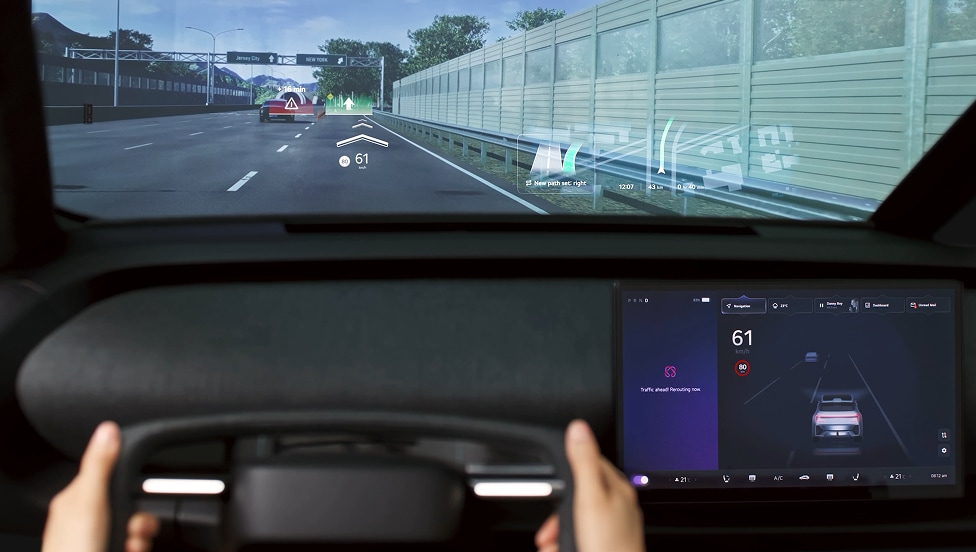 Windshield display scene shows LG VS UltraView Windshield Display presenting driving information across the windshield.