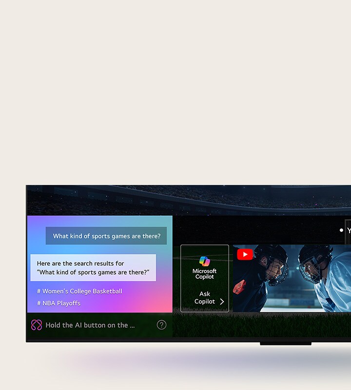 Pemandangan dekat layar TV LG QNED yang menunjukkan cara kerja AI Search. Jendela obrolan kecil terbuka, menunjukkan bagaimana pengguna menanyakan pertandingan olahraga apa saja yang tersedia. AI Search merespons melalui obrolan dan dengan menampilkan thumbnail konten yang tersedia. Ada juga prompt untuk bertanya kepada Microsoft Copilot.