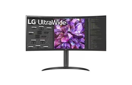 An LG Ultrawide Display monitor with an ultra-wide screen showing colorful abstract waves on a white background.