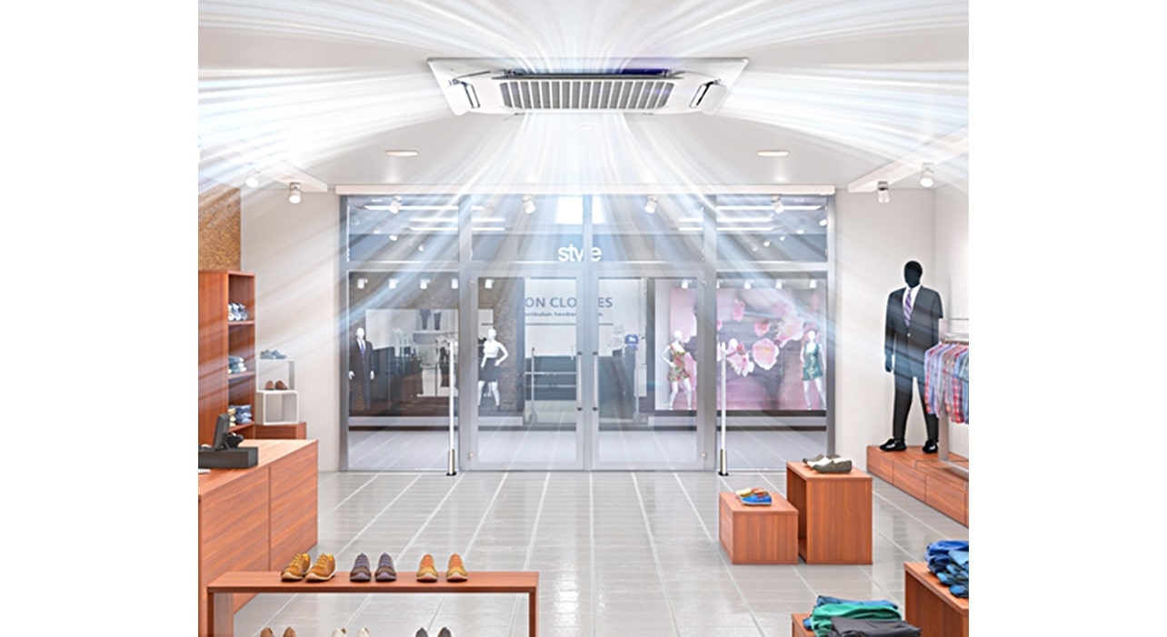 تدفق الهواء من مكيف كاسيت مزدوج اللوحة في أحد متاجر البيع بالتجزئة.