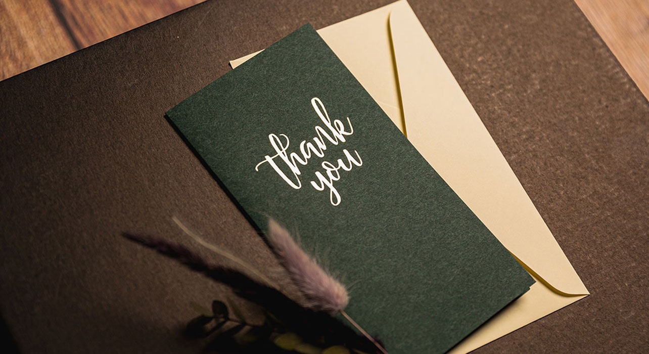 Thank you' card on gift box