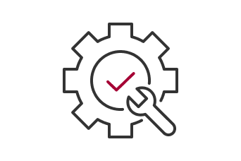 A cogwheel with a red wrench inside it and a red checkmark in the center.