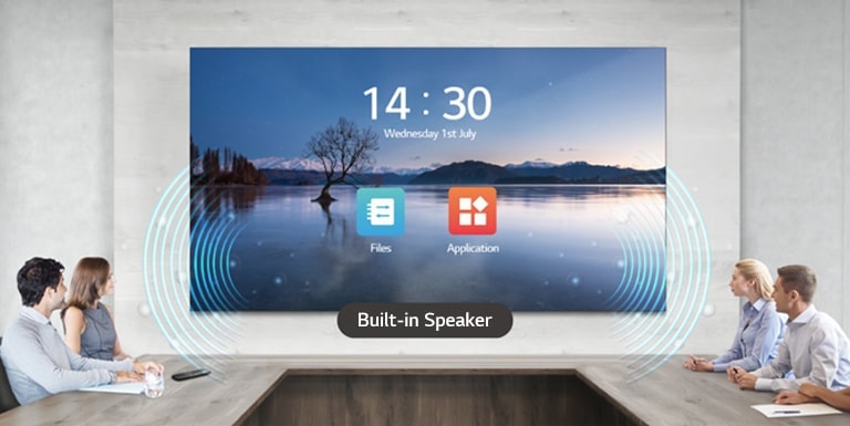 People have a meeting while watching the display and listening sound with the LAEC and its built-in speaker, installed in the meeting room.