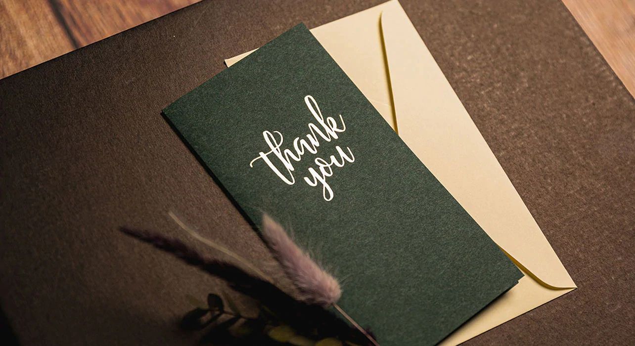 Thank you' card on gift box