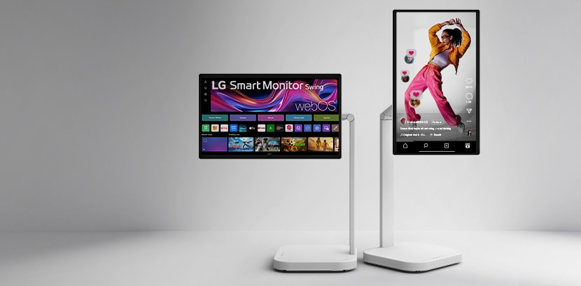 Biri ana ekranı yataya, diğeri ise dikey yönde sosyal medya arayüzüne sahip dikey bir video görüntüleyen webOS özellikli iki LG Smart Monitor Swing ekranının önden görünümü.