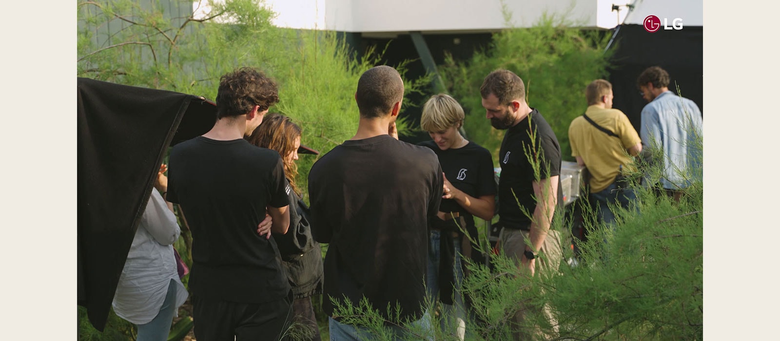 People gathered in the grass