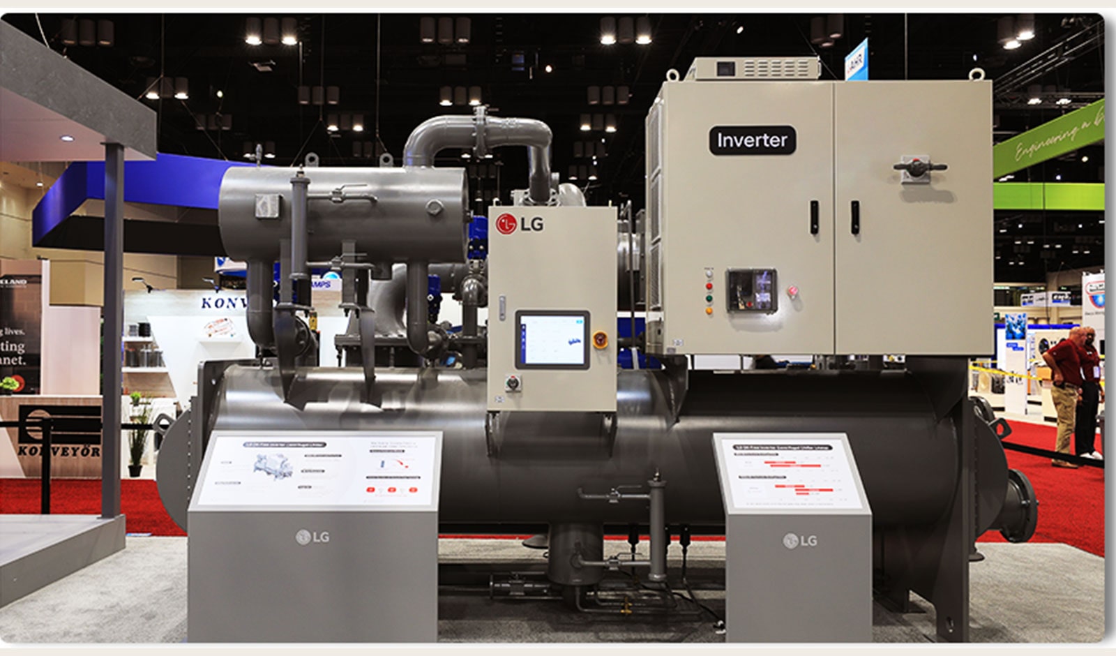 LG's chiller system with inverter unit displayed at trade show, featuring advanced HVAC technology and control panels.