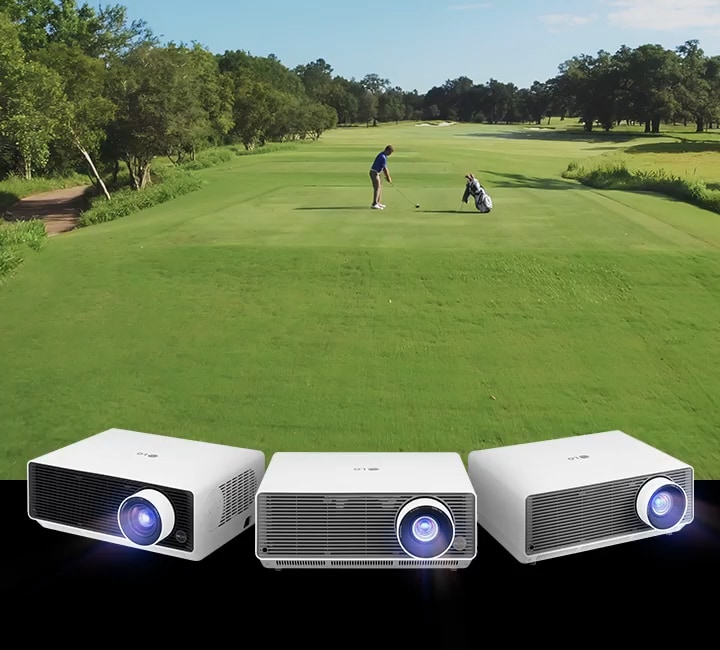 This is a video of a golfer hitting a ball on a golf course. Below are three LG ProBeam projectors with glowing lights. 