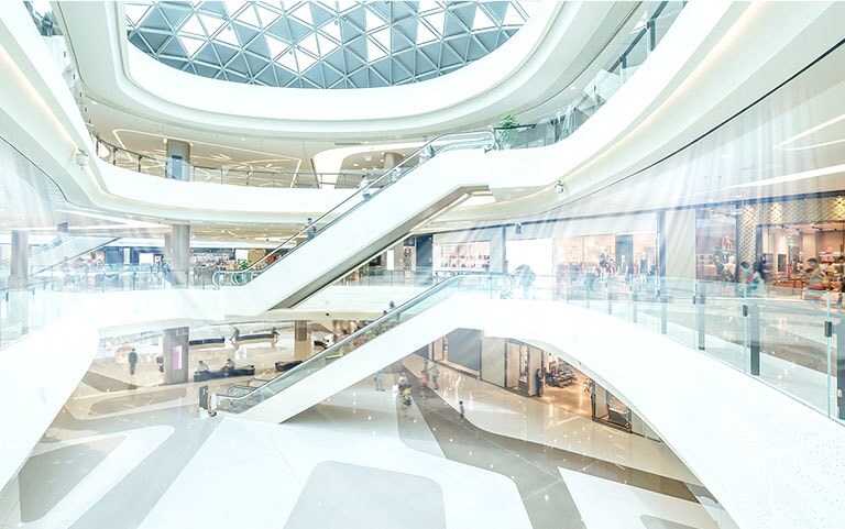 An image of an atrium at a shopping mall with air conditioning on.