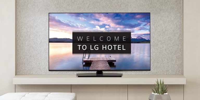 A TV is screening greeting messages with images.