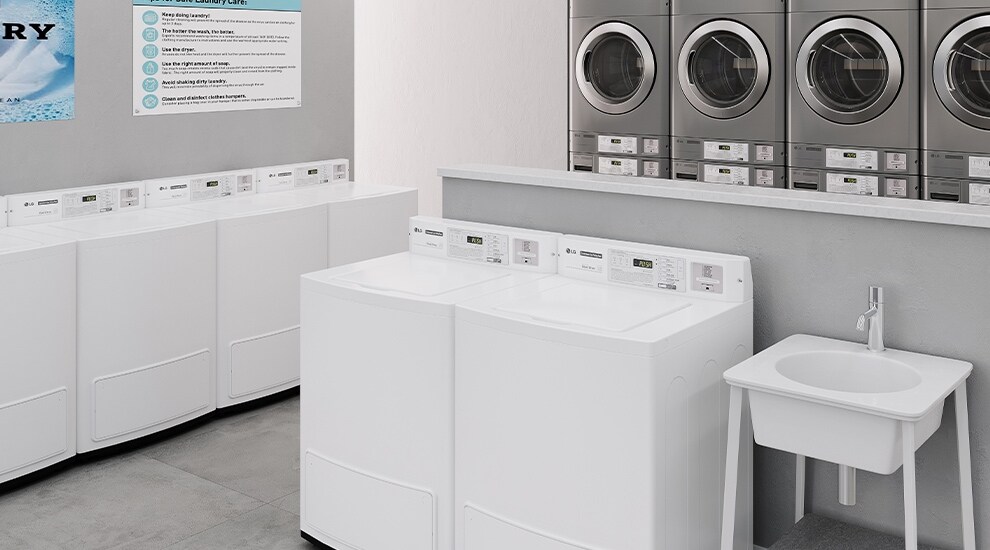 Exterior wall with Wash to Go self-service laundry sign and view into laundromat with LG washers