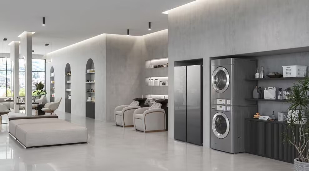 Modern lounge with LG stacked washer and dryer integrated into interior design