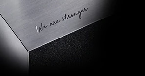A close up shot of the LG SIGNATURE OLED R casing with the text 'Stronger Together' engraved on it.
