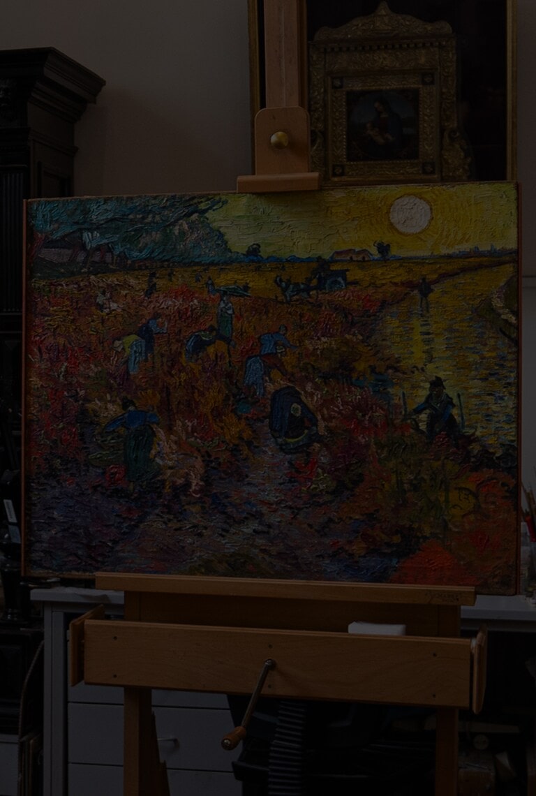 An image of The Red Vineyards at Arles on an easel.