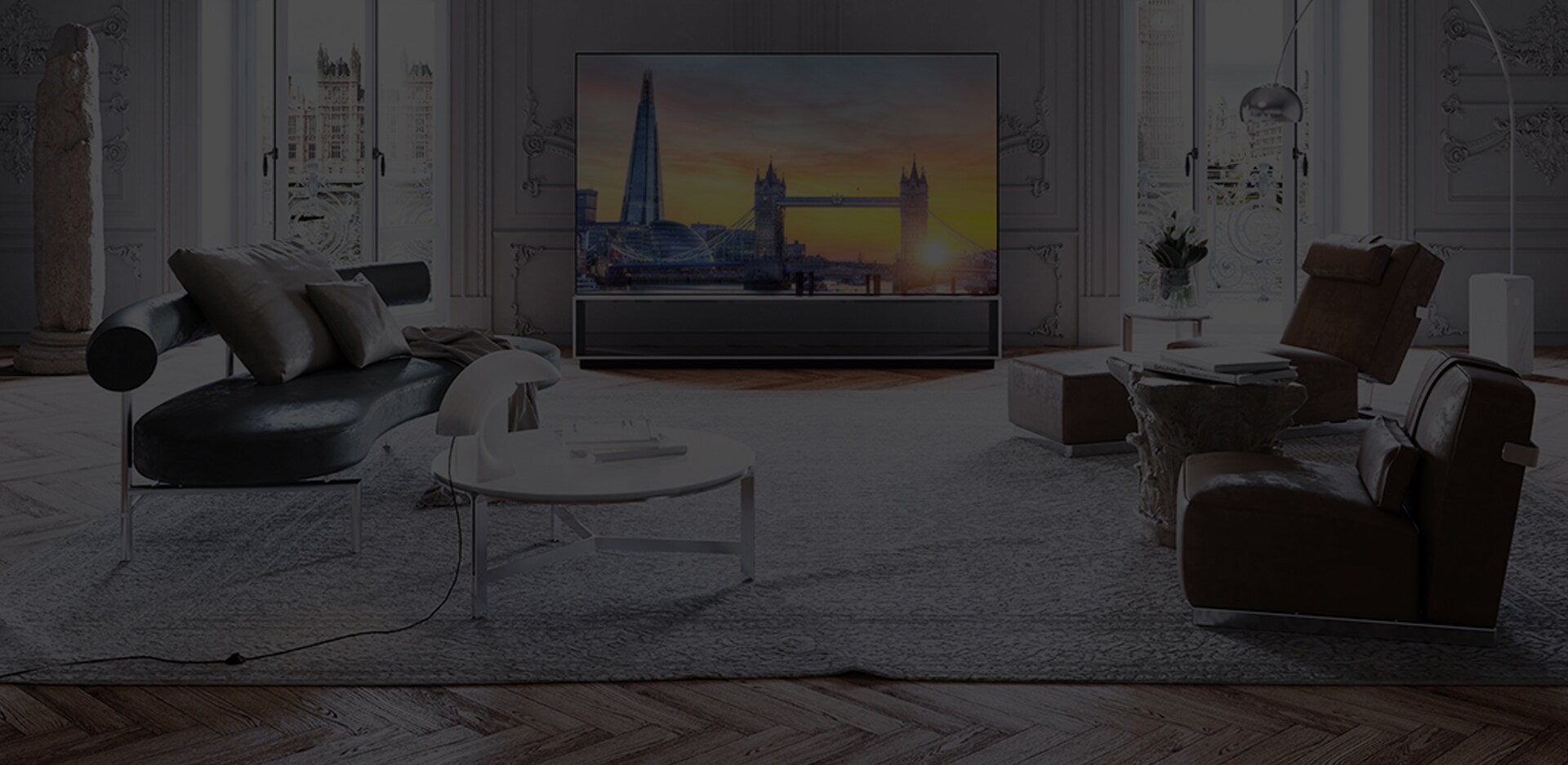 LG SIGNATURE OLED 8K TV is placed in the room amongst the Victorian cornices and parquet floors with Flexform's furnishing items.
