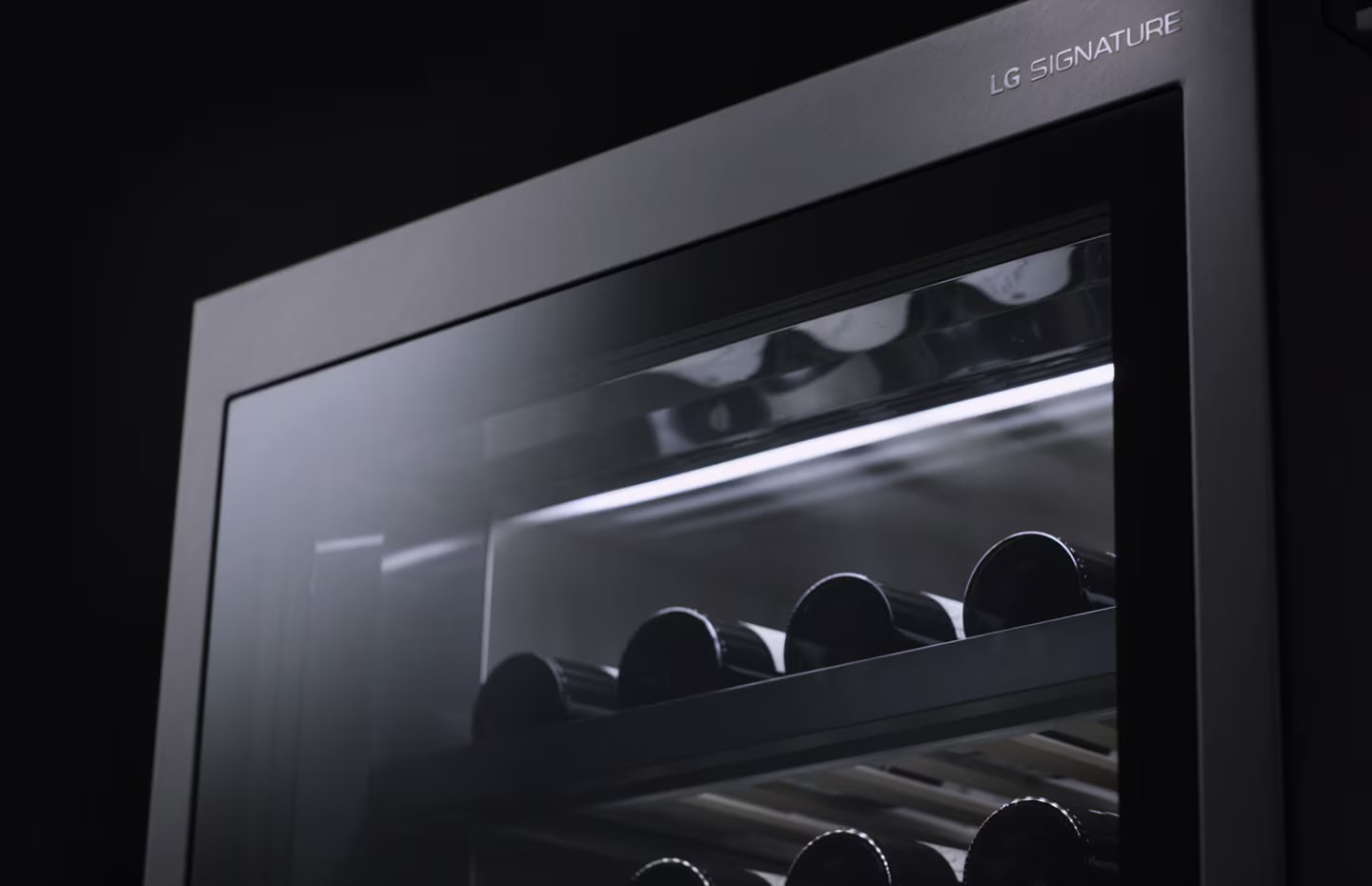 Close shot of upper compartment with several bottles of wine laid on in the LG SIGNATURE Wine Cellar.