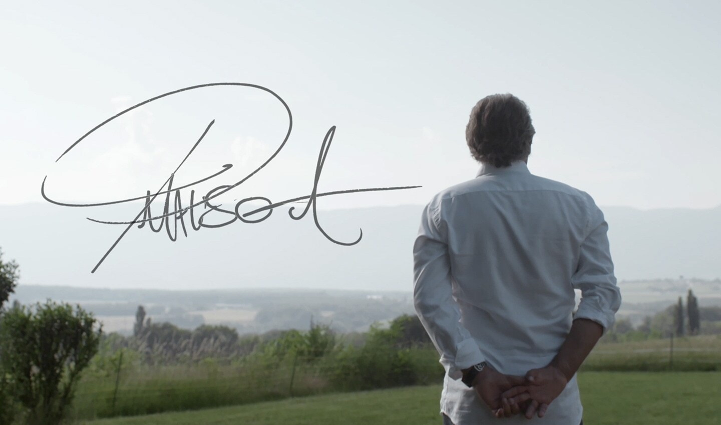 Photograph taken outside of Antoine Preziuso with his autograph written on
