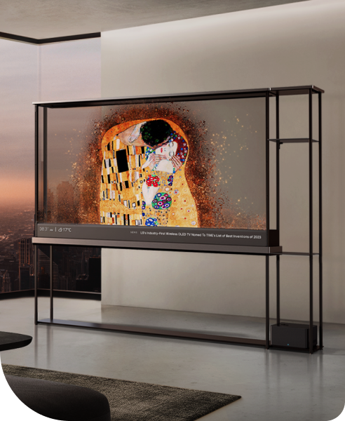 An LG OLED T illuminates the snowy landscape, dividing the living room like a partition without spoiling the ocean view outside.