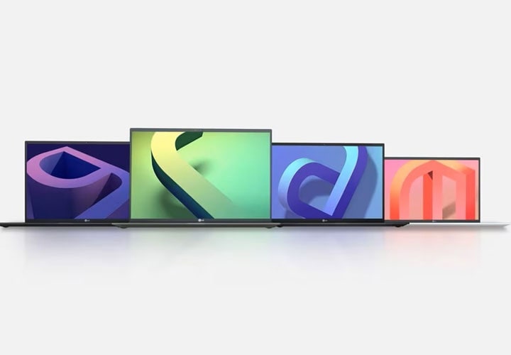 Uma fileira de quatro laptops LG Gram, cada um exibindo um design abstrato colorido diferente em suas telas, dispostos em uma superfície branca com um fundo claro.