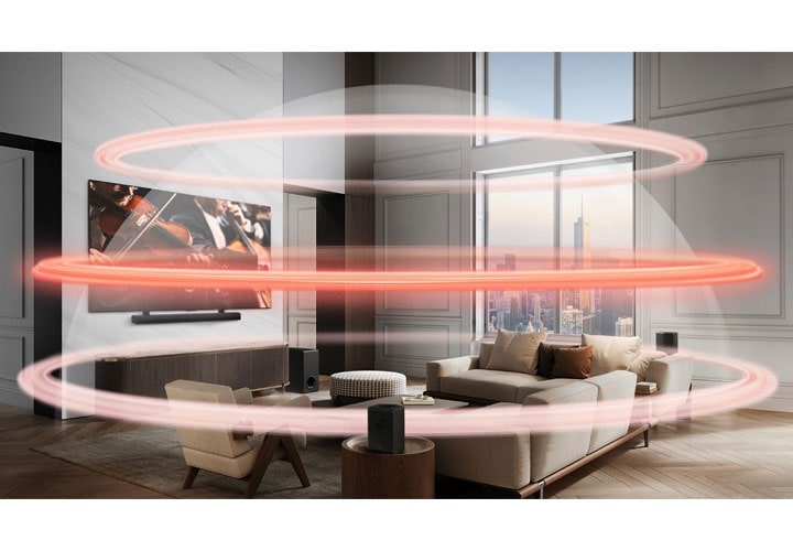 Texto alternativo: Uma elegante soundbar LG fica em um balcão embaixo de uma TV, que exibe um jogo de corrida. A parede branca do ambiente destaca as linhas limpas do sistema de entretenimento e enfatiza o conteúdo.
