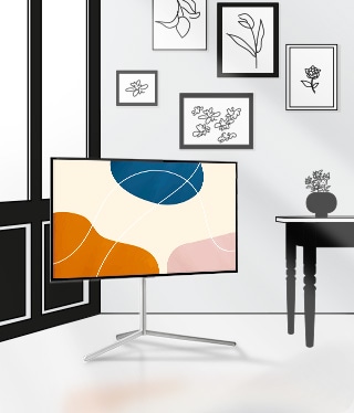 A TV attached to a gallery stand is placed in the house.