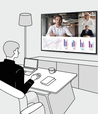 A man is working at home using a TV.