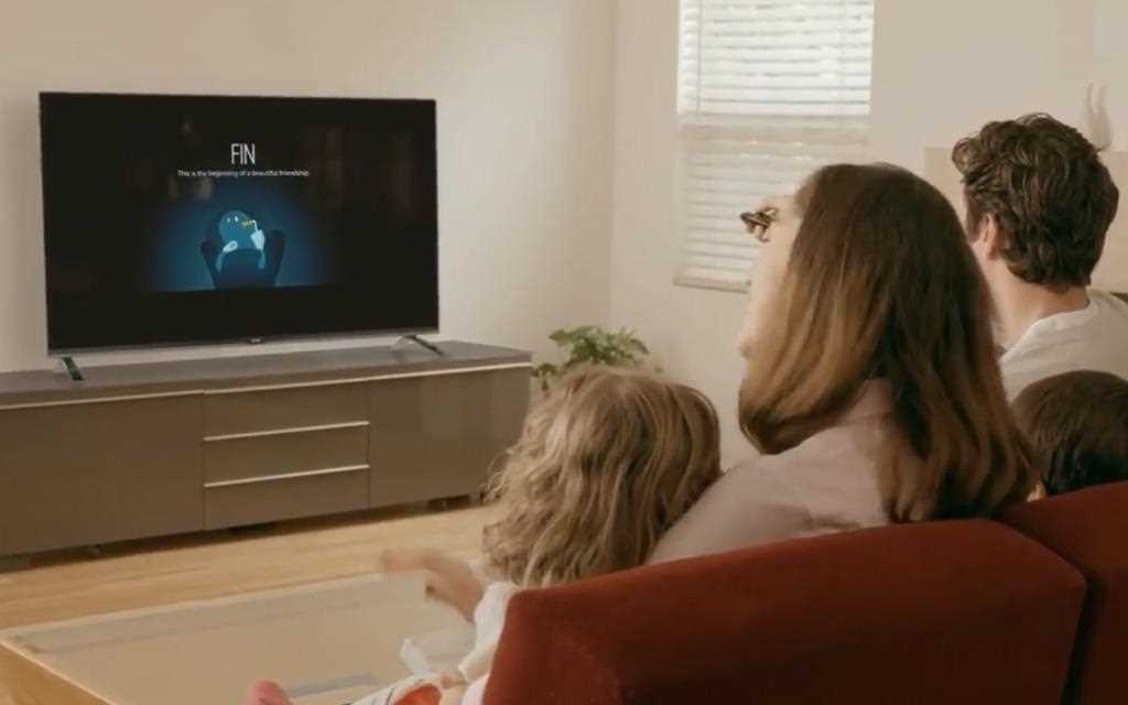 An image of family watching LG smart TV in living room